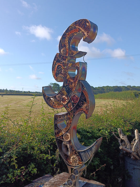 Metal sculpture inspired by waves