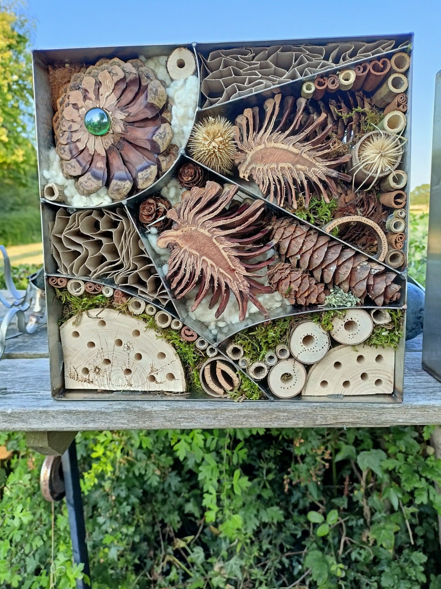 Wall art using a unique combination of metal and organics