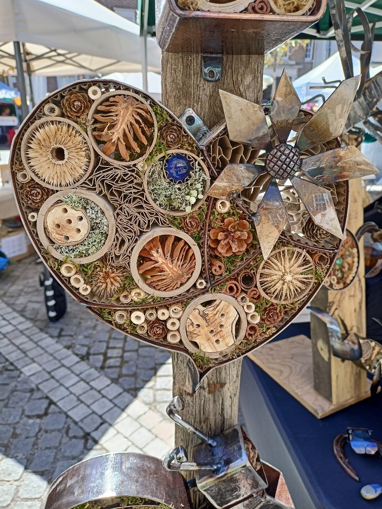 Heart shaped insect refuge wall art