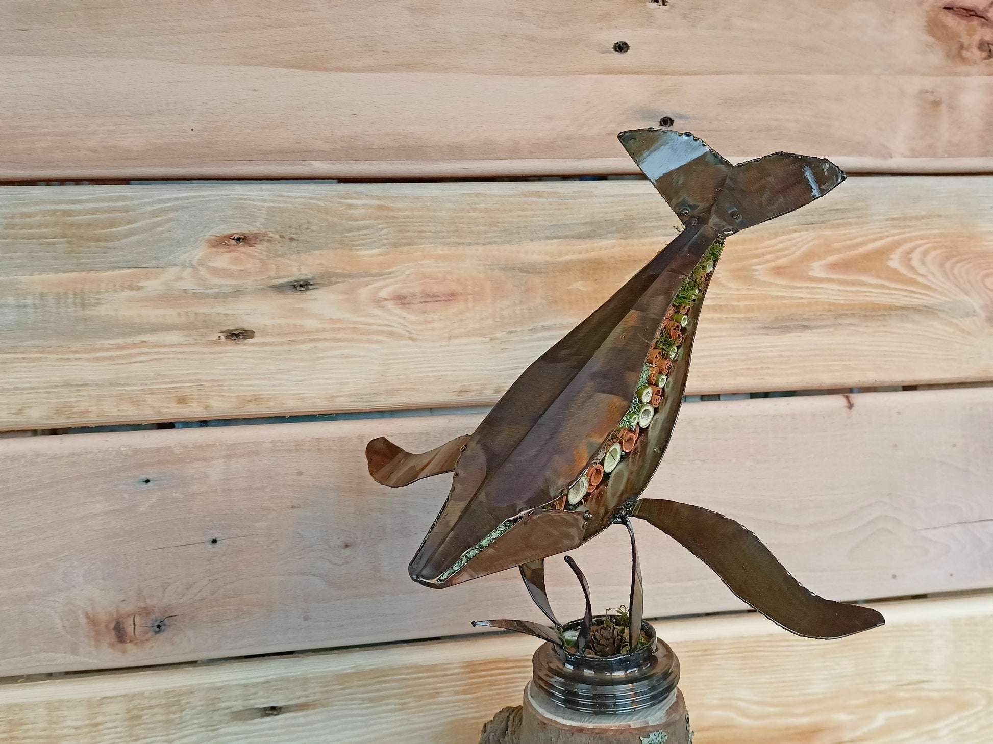 humpback whale filled with organics and swimming through the air.