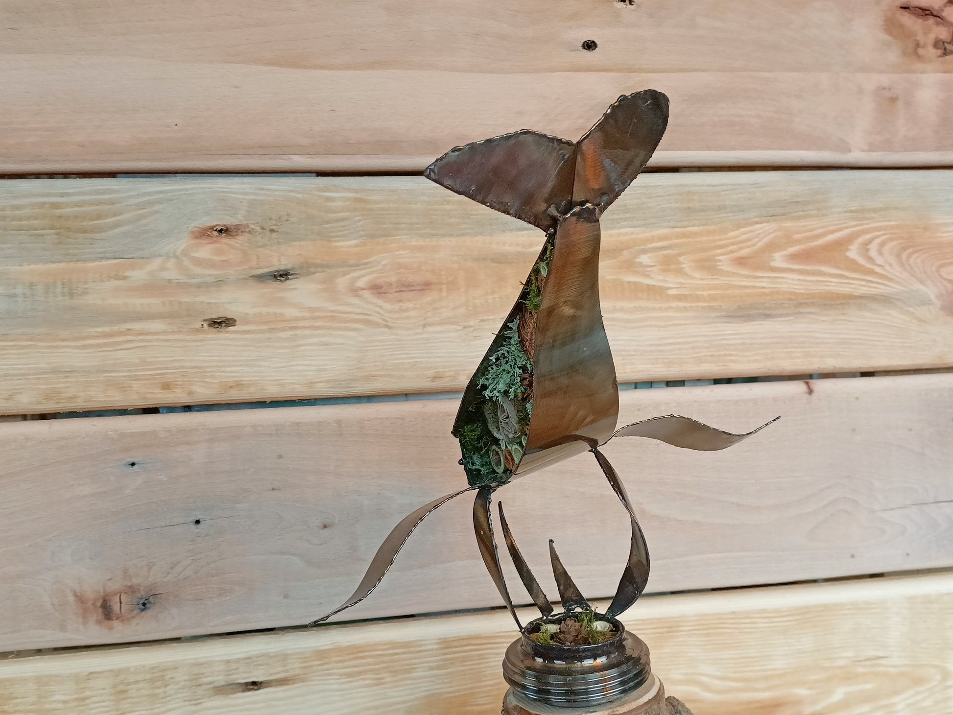 humpback whale filled with organics and swimming through the air.