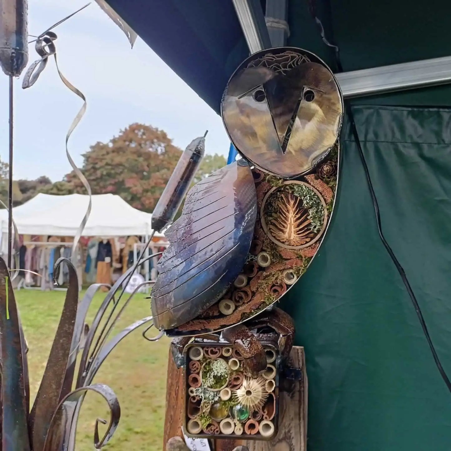 owl garden sculpture with insect refuge