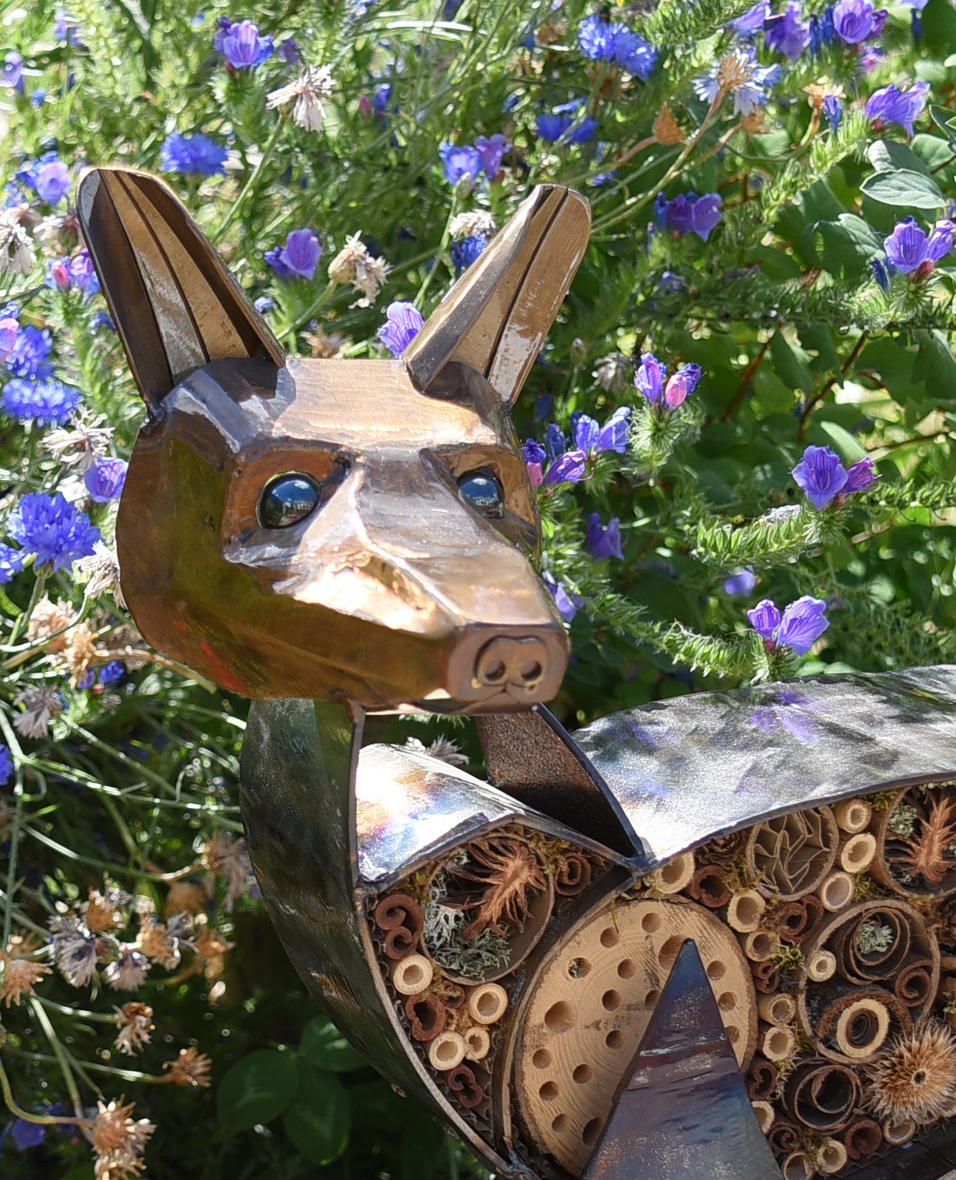 Fox sculpture with insect refuge