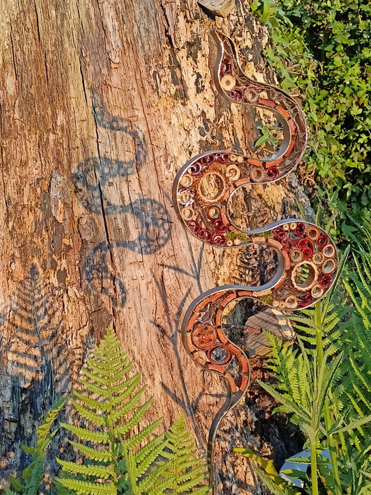 Unique garden art in the form of an organic swirl.