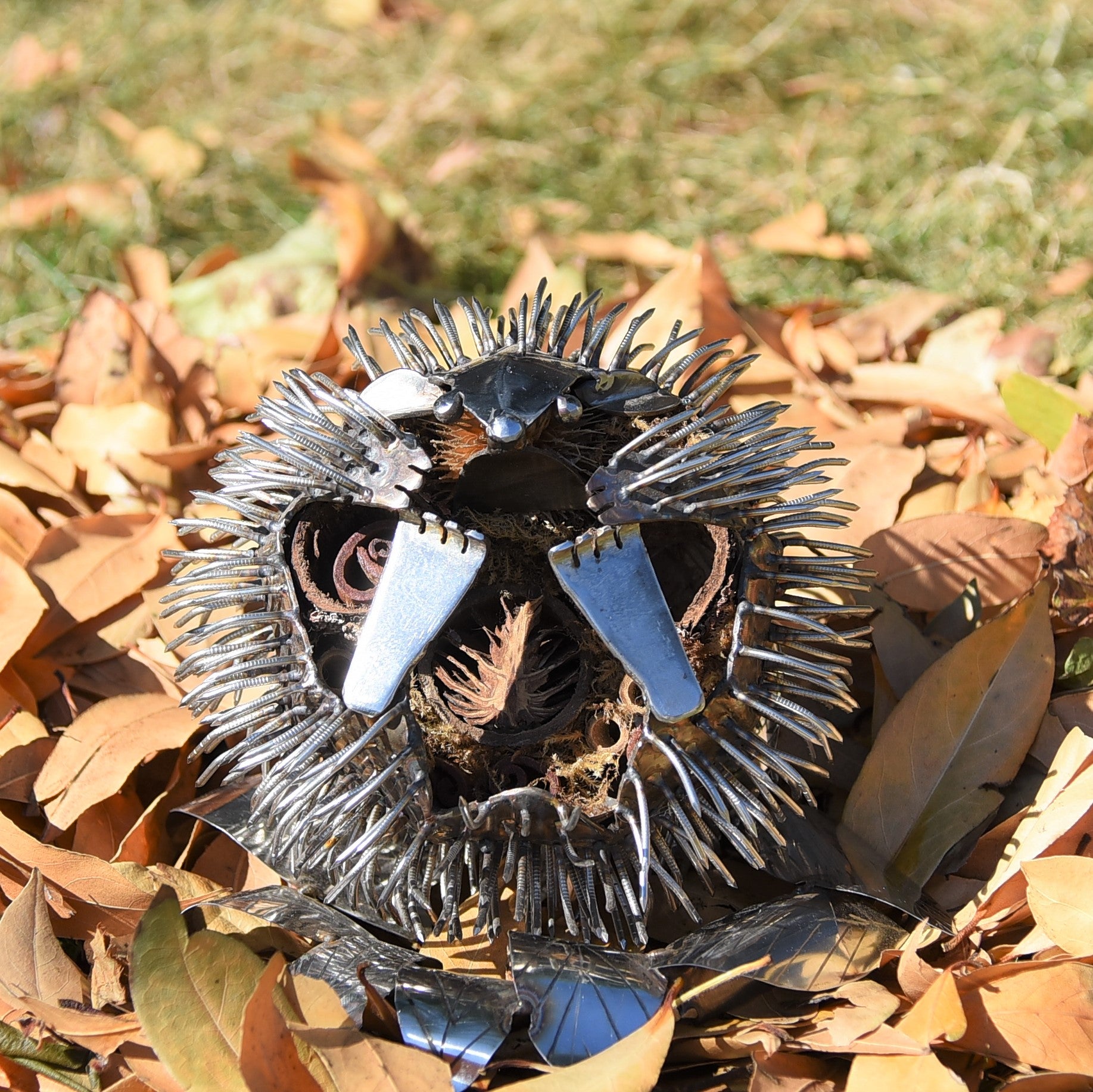 Hedgehog made from stainless steel, curled up in a ball