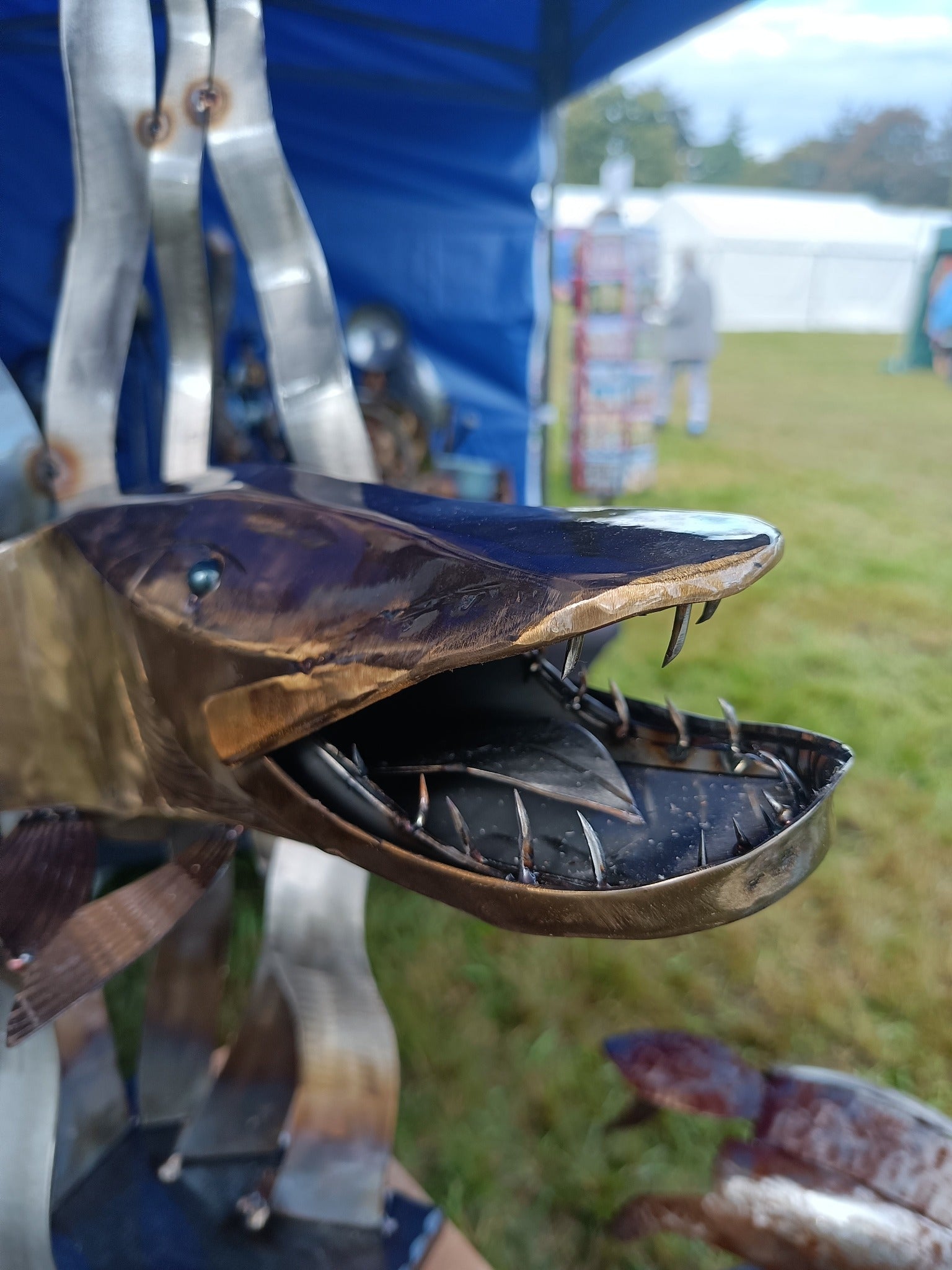 Pike with very sharp teeth, made from 100 % upcycled, marine stainless steel