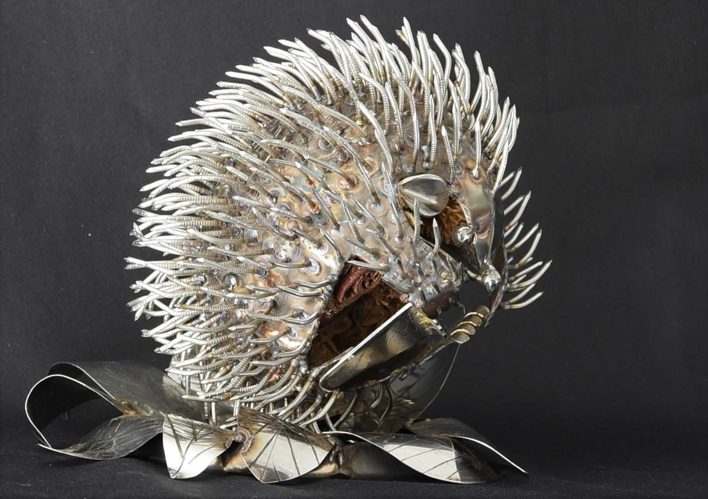 erin the hedgehog stainless steel garden sculpture. Side view